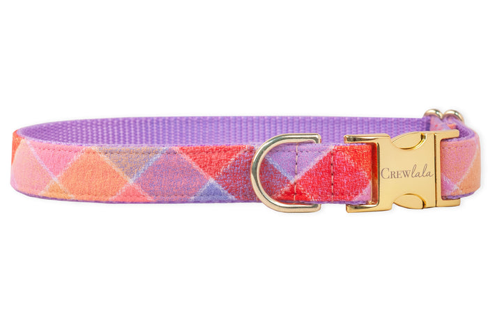 Flannel dog collar in a cheerful multicolor plaid pattern. The metal hardware includes a curved quick-release buckle engraved with “Crewlala” and a matching leash ring. Interior is lined with durable nylon woven webbing.