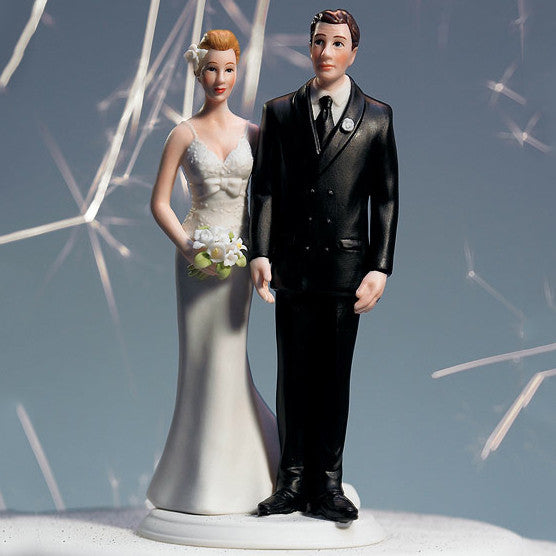 The front of the Love Pinch Couple Wedding Cake Topper - Caucasian