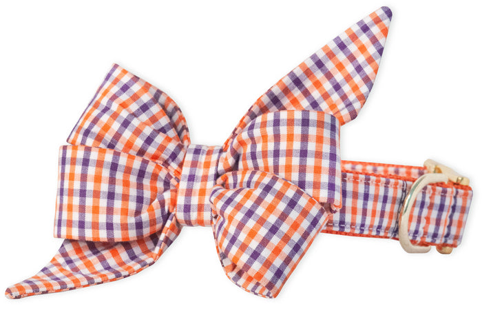 A statement-making belle bow attached to a matching plaid dog collar. With its crisp structure and bold pattern, this accessory turns everyday walks into photo ops.