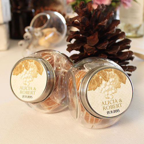 Mini Glass Jars filled with caramels and decorated with a flower sticker (caramels and sticker not included.).