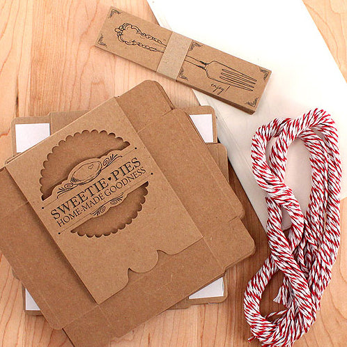 The Mini-Pie Wrapping Kit for Wedding Favors, includes pie boxes, pre-cut twine, tags, and wax sheets.