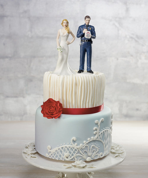 Wedding Cake Top - Policeman Groom Figurine giving the bride a Love Ticket.